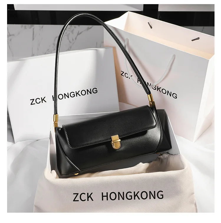 Genuine Leather Armpit Bag: Retro Niche Solid Color Portable Shoulder Bag 16 kf S08f5d3f3e0f449aeb5c883d65e7e74e7A
