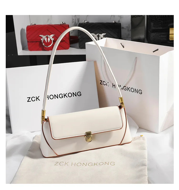 Genuine Leather Armpit Bag: Retro Niche Solid Color Portable Shoulder Bag 24 kf S1543a099ba424937ae0744e04ae439c9U